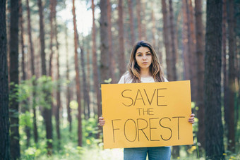 年轻的美丽的女人<strong>志愿者</strong>积极分子森林<strong>海报</strong>保存森林