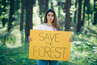 年轻的美丽的女人<strong>志愿</strong>者积极分子森林<strong>海报</strong>保存森林