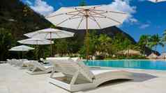 糖海滩圣露西娅白色热带海滩棕榈树奢侈品海滩椅子露西娅加勒比