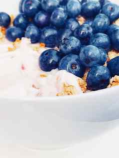 蓝莓酸奶麦片碗健康的早餐早....餐甜蜜的食物有机浆果水果饮食营养