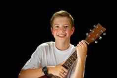 快乐男孩玩声吉他少年男孩经典木吉他