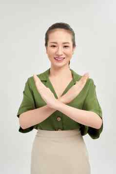 年轻的美丽的年轻的亚洲女人交叉手信号孤立的白色背景