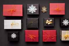 渲染红色的颜色礼物盒子黑色的丝带孤立的黑色的背景圣诞节装饰前视图设计