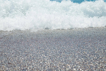 卵石<strong>海滩</strong>Azure海水纹理背景清晰的海水卵石<strong>海滩</strong>纯水石头<strong>海岸海岸</strong>线用石头砸<strong>海岸</strong>华丽的海景假期夏天天堂