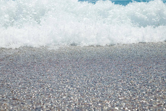 卵石海滩Azure海水纹理背景清晰的海水卵石海滩纯水石头海岸海岸线用石头砸海岸华丽的海景假期夏天天堂图片