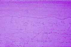 质子紫色的难看的东西墙水泥纹理石膏背景发光的霓虹灯石头纹理质子紫色的建筑墙明亮的霓虹灯颜色时尚的时尚