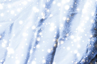 假期冬天背景奢侈品皮毛外套纹理细节发光的雪