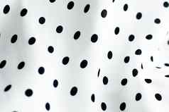 经典波尔卡点纺织背景纹理黑色的点白色奢侈品织物设计模式