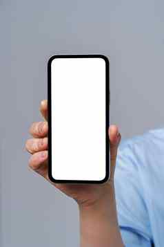 成熟的女人手持有智能手机白色屏幕孤立的白色背景现代电话触摸屏幕女人手关闭模拟移动应用程序广告