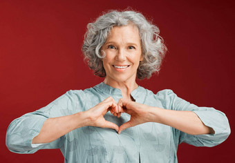 <strong>爱心</strong>健康退休女人爱的表情<strong>符号</strong>标志图标象征显示护理感情红色的情人节一天工作室背景灰色高级养老金领取者时尚的表情<strong>符号</strong>构成