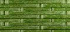 绿色竹子栅栏背景绿色竹子水平现实的纹理木竹子背景