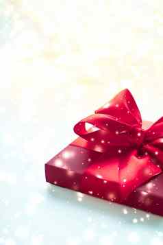 冬天假期红色的礼物盒子发光的雪圣诞节礼物惊喜