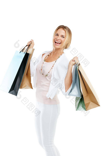 <strong>抵制</strong>太棒了讨价还价工作室肖像快乐年轻的女人携带购物袋白色背景
