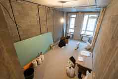 工作过程安装金属帧石膏板干墙使石膏墙公寓建设重构改造扩展恢复重建