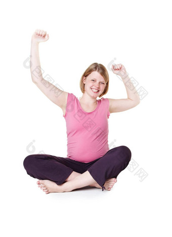 女人快乐微笑地板上怀孕了庆祝活动工作室模型白色背景肖像健康的妈妈。怀孕快乐的婴儿健康快乐的兴奋