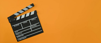 克拉珀董事会橙色背景复制空间电影最小的概念