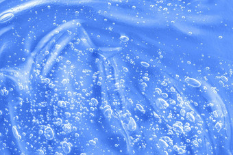 液体抗菌消毒涂片涂抹透明质酸酸清晰的血清样本化妆品蓝色的过来这里纹理泡沫护肤品保湿产品背景洗手液斯沃琪