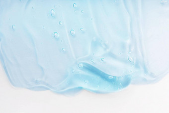 清晰的护肤品产品涂抹特写镜头奶油过来这里蓝色的透明的化妆品样本泡沫孤立的白色背景手洗手液卫生液体过来这里