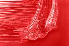 过来这里纹理泡沫红色的保湿霜涂片涂抹果冻清洁剂化妆品产品血清液体化妆品奶油胶原蛋白样本透明质酸酸碳粉视黄醇斯沃琪
