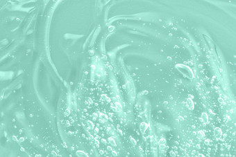 液体绿色石油涂抹概念自然化妆品透明质酸酸清晰的血清样本芦荟真正化妆品过来这里纹理泡沫背景