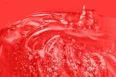 透明质酸酸碳粉斯沃琪透明的奶油样本涂抹胶原蛋白维生素血清液体化妆品果冻化妆品产品红色的保湿霜涂片过来这里纹理泡沫特写镜头