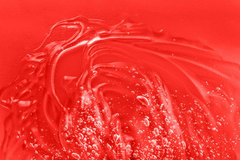 红色的保湿霜涂片涂抹过来这里纹理泡沫果冻清洁剂化妆品产品血清液体化妆品奶油胶原蛋白样本透明质酸酸碳粉视黄醇斯沃琪