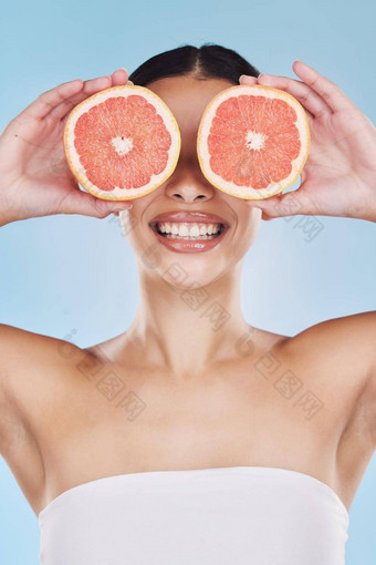 葡萄柚护肤品美化妆品健康的产品营养脸蓝色的模型工作室背景自然牙科健康水果清洁身体微笑快乐模型