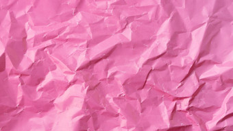 皱纹彩色的纸背景纹理大量的粉红色的