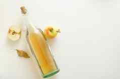 前视图瓶苹果苹果酒醋苹果作文白色背景