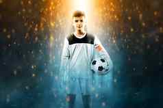 足球球员孩子足球冠军男孩守门员运动服装体育场球体育运动概念