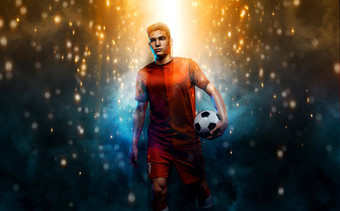 足球球员少年足球球员男孩足球运动服装游戏球体育运动概念
