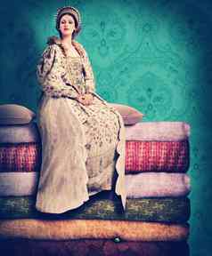 床上适合女王肖像君威女王坐着堆栈毯子