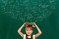 孩子们数学教育概念可爱的女孩数学学生学校背景手图纸科学公式模式