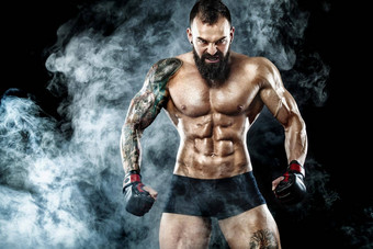 运动员拳击手战斗黑色的背景烟复制空间拳击体育运动概念