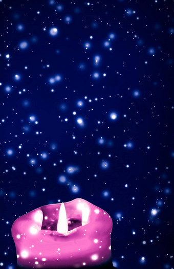 粉红色的假期蜡烛蓝色的闪闪发光的下雪背景奢侈品品牌设计圣诞节年夏娃情人节一天