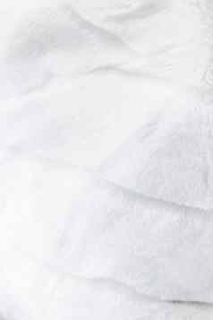 奢侈品白色皮毛外套纹理背景人工织物细节