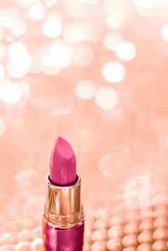 粉红色的口红玫瑰黄金圣诞节年情人节一天假期闪闪发光的背景化妆化妆品产品奢侈品美品牌