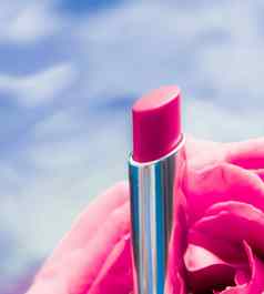 粉红色的口红玫瑰花液体背景防水魅力化妆唇光泽化妆品产品奢侈品美品牌假期设计