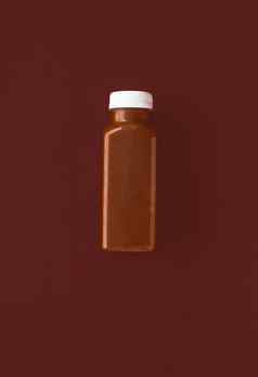 排毒超级食物奶昔巧克力瓶重量损失净化棕色（的）背景平铺设计食物营养专家博客