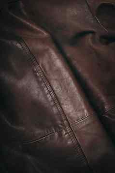 棕色（的）皮革材料高度详细的特写镜头皮革纹理很酷的背景