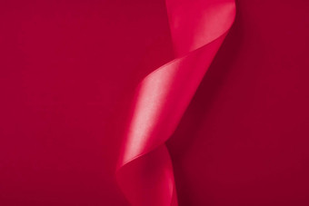 摘要卷曲的丝绸丝带粉红色的背景独家奢侈品品牌设计假期出售产品促销活动魅力艺术邀请卡背景