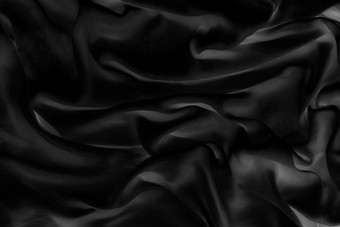 奢侈品黑色的软丝绸平铺背景纹理假期魅力摘要背景