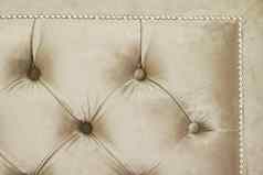 奢侈品丝绒绗缝沙发室内装潢按钮优雅的首页装饰纹理背景