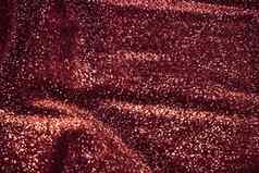 红色的假期闪闪发光的闪闪发光的摘要背景奢侈品闪亮的织物材料魅力设计节日邀请