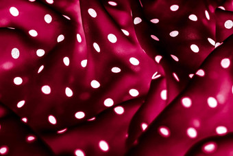经典波尔卡点纺织背景纹理白色点红色的奢侈品织物设计模式