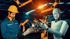 电脑化行业机器人人类工人工作未来工厂
