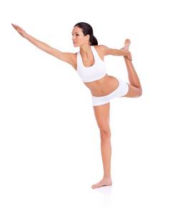 平衡完美完整的长度工作室拍摄年轻的锻炼服装平衡腿孤立的白色
