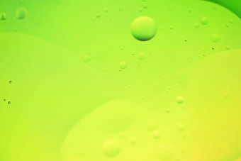 绿色黄色的摘要背景图片使石油水肥皂