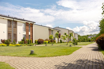 行现代别墅品牌行单家庭房子现代设计城市生活住宅私人庭院复杂的完成发展绿色户外设施草坪上
