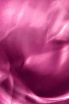粉红色的摘要艺术背景丝绸纹理波行运动经典奢侈品设计